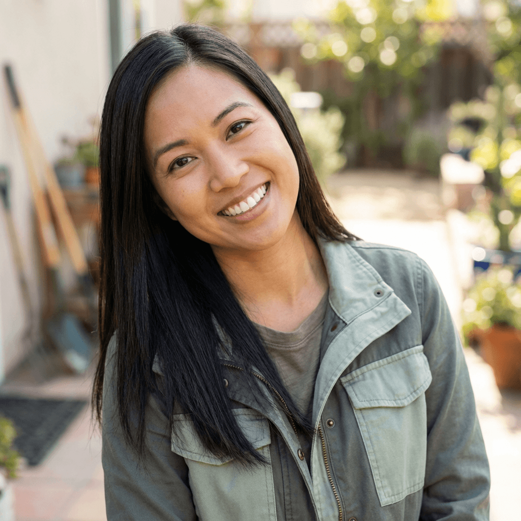 Maria T. in her early 50s, Hispanic, smiling with relief at home